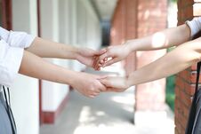 Two Girls Hand In Hand Hand Close Up Stand For Friendship Stock Photo