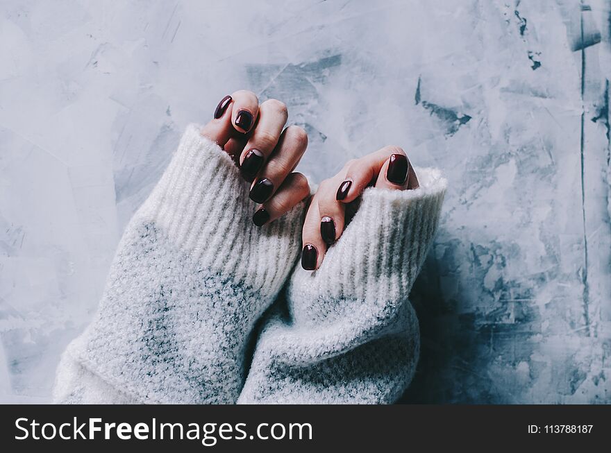 Woman hands with new nails on table. Woman hands with new nails on table