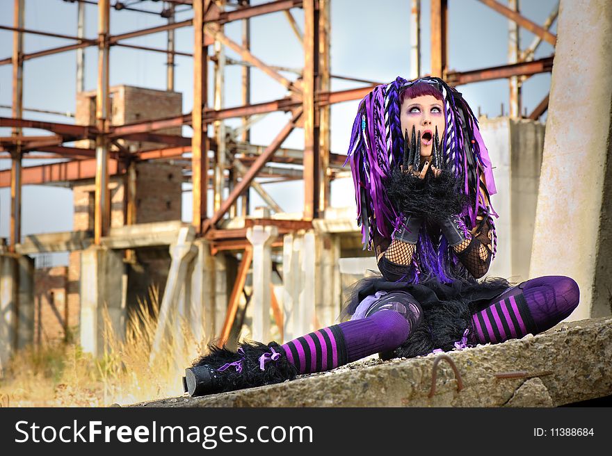 Cyber gothic girl in the industrial environment