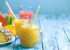 Fresh Pineapple And Watermelon Smoothie In Three Glasses On A Blue Wooden Rustic Background Stock Photo