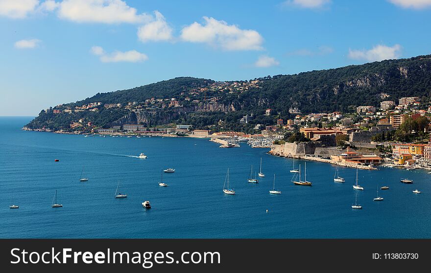 Nice French riviera, Côte d`Azur, mediterranean coast, Eze, Saint-Tropez, Cannes and Monaco. Blue water and luxury yachts.