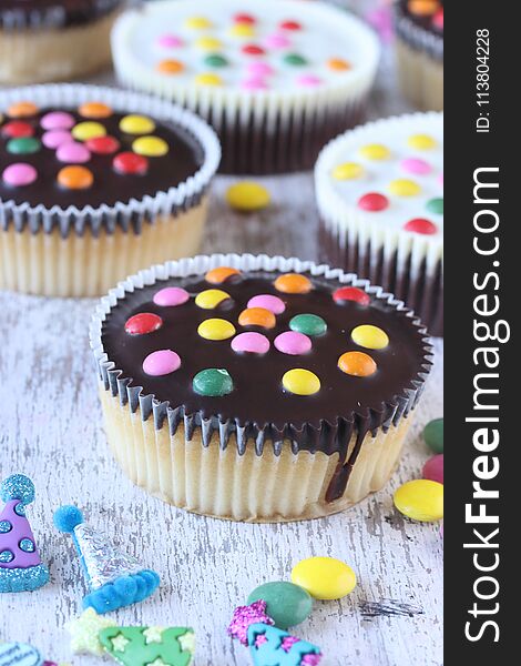 Cupcakes with sugar coated chocolate