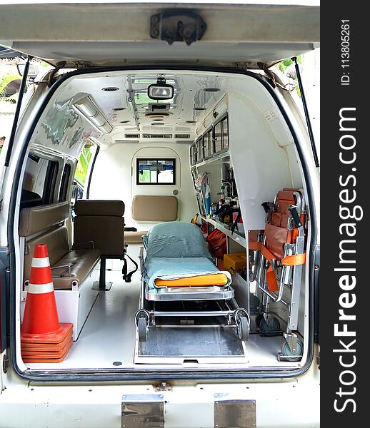 Inside an ambulance with medical equipment . Car for patient refer