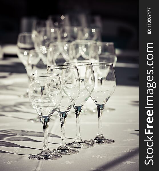 CloseUp on collection of pure, empty glasses for water or wine