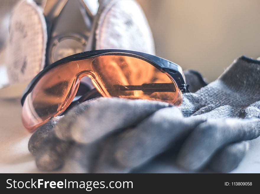 Closeup Photo of Black Framed Brown Sunglasses