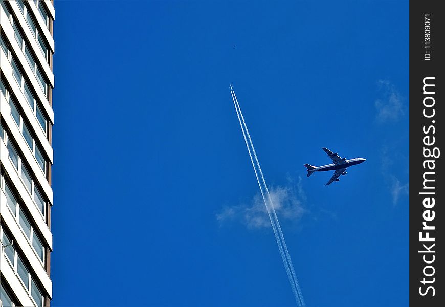 Grey Passenger Plane On Sky At Daytime