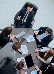 Business Team Discussing In Office Financial Issues Royalty Free Stock Photo Business Team Discussing In Office Financial Issues Royalty Free Stock Photo