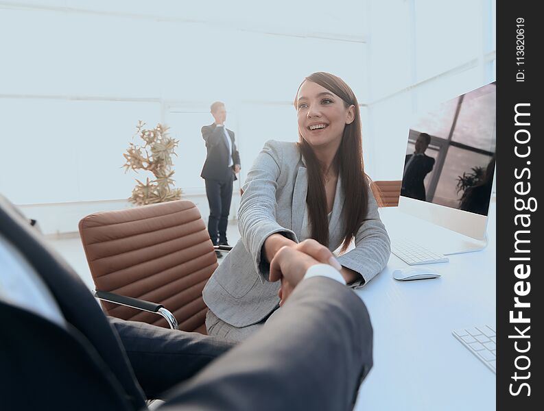 Business people shaking hands with each other.