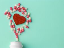 Meny Different White And Pink Pills. Medicine Background From Much Capsules. Drugstore Set. Red Heart Stock Images Meny Different White And Pink Pills. Medicine Background From Much Capsules. Drugstore Set. Red Heart Stock Images