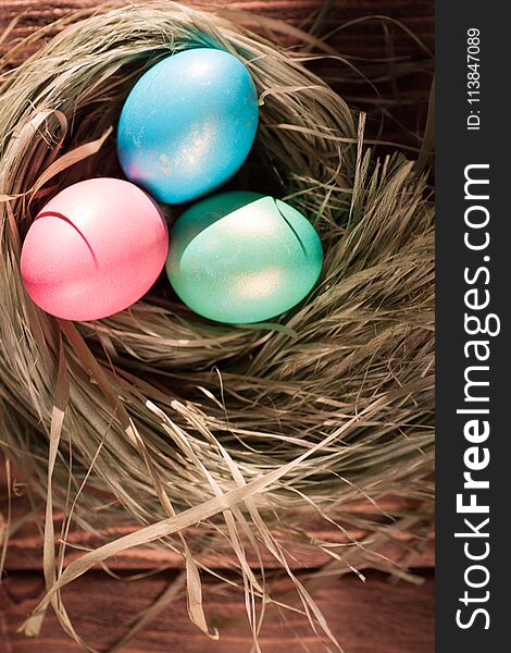 Colorful easter eggs in basket a