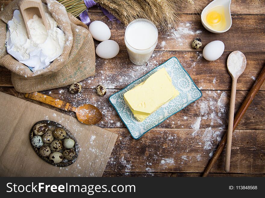 Natural organic ingredients to make cookies as dough, flour, eggs, butter,milk