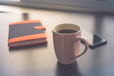 Coffee Break Business. Cup Of Coffee Mobile Phone And Notebook. Morning Coffee Concept Stock Photo