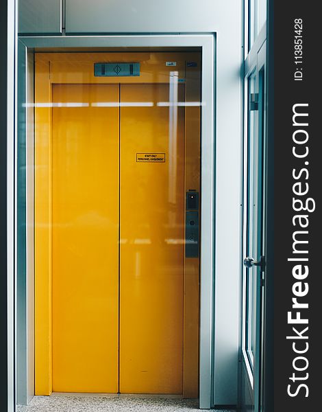 Closed Yellow Elevator Door