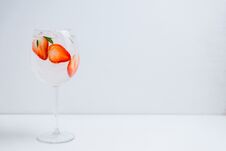 Gin With Strawberry And Ice In Wine Glass Stock Photos