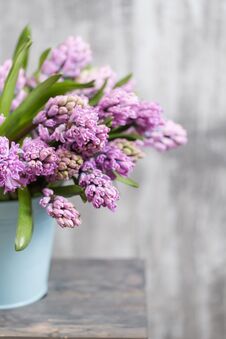Bouquet Of Beautiful Violet And Lilac Hyacinths. Spring Flowers In Vase On Wooden Table. Bulbous Plant. Vertical Photo Royalty Free Stock Photos