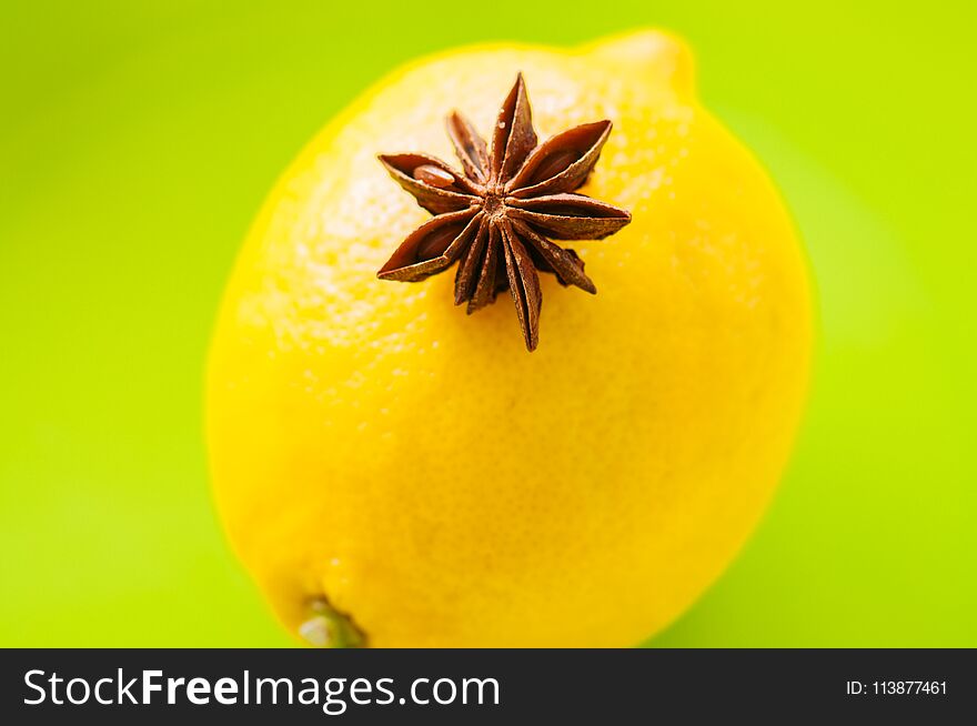 Close up of yellow lemon and anise star.