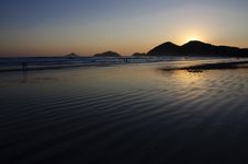 Sunset At A Tropical Beach Stock Photos