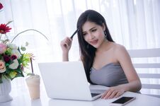 Smart Girl`s Working On Notebook , Workingwoman Using Laptop In Royalty Free Stock Images Smart Girl`s Working On Notebook , Workingwoman Using Laptop In Royalty Free Stock Images