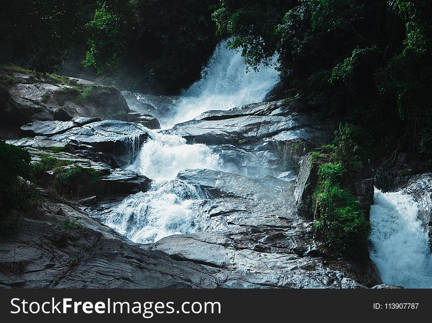 Photography of Waterfalls Near Trees