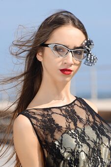 Beautiful Girl In Fashion Outfit By The Sea Stock Photography