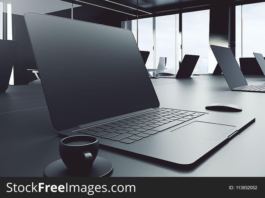 Side view of empty laptop placed on grey office desktop with coffee cup and other items. Mock up, 3D Rendering. Side view of empty laptop placed on grey office desktop with coffee cup and other items. Mock up, 3D Rendering