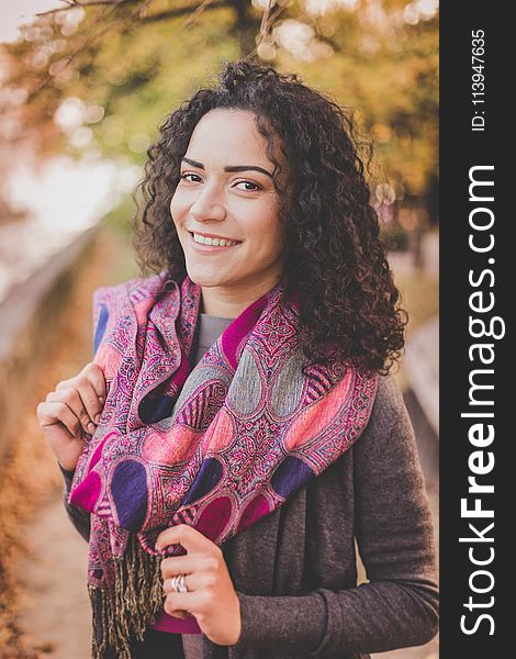 Woman Wearing Pink Infinity Scarf