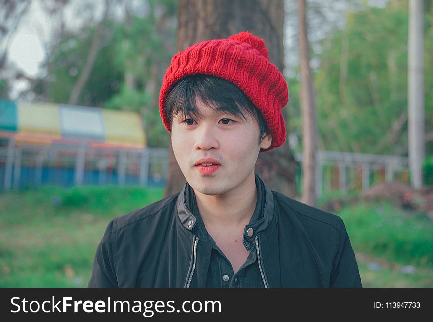 Man Wearing Red Knit Cap