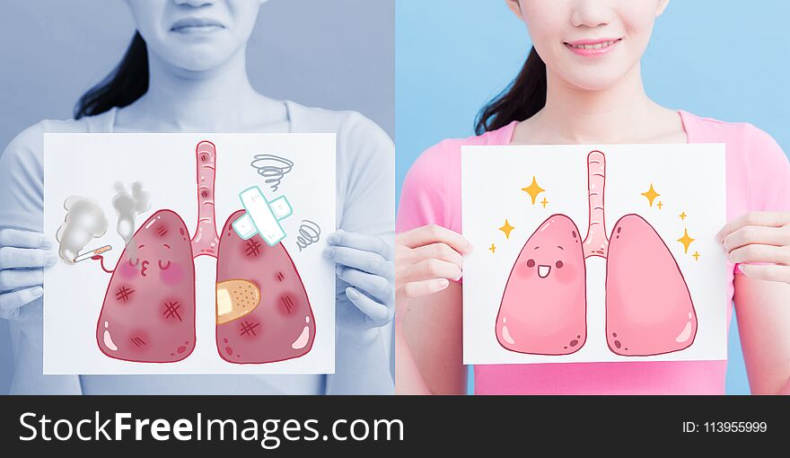 Woman take lung billboard with health concept on the blue background