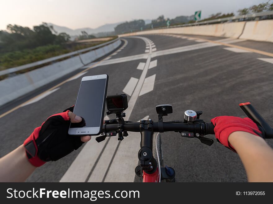 Cyclist Using Smartphone For Navigation