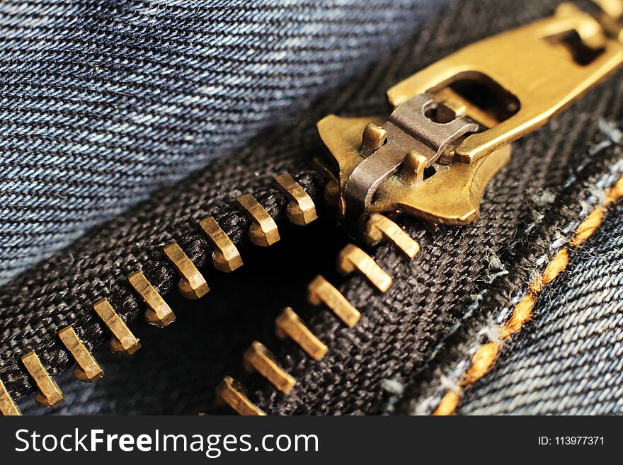 Metal Zipper And Lock On Jeans Background, Macro