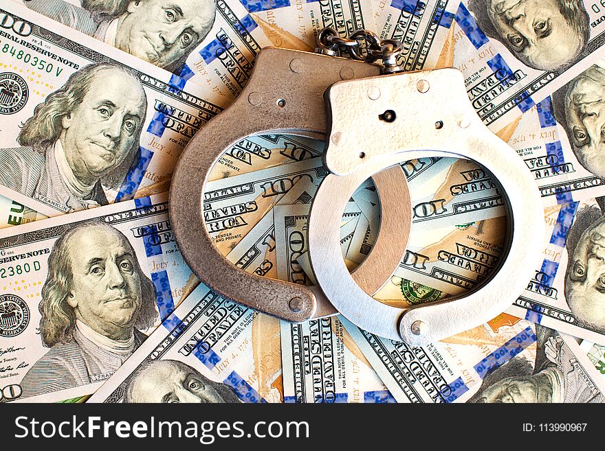 Bitcoins And Handcuffs As An Abstract Symbol Of Crime That Can H