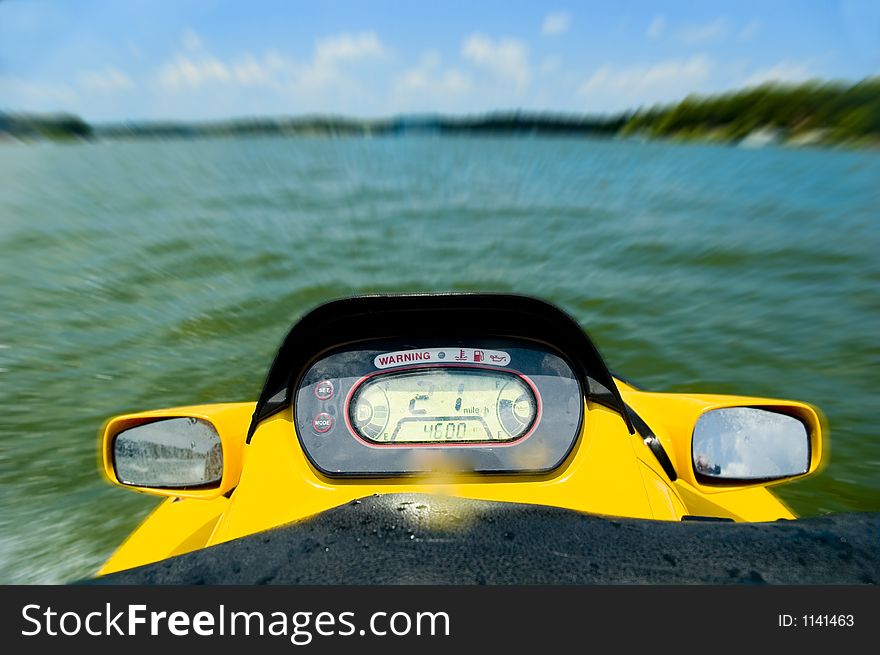 Personal watercraft, waverunner, jetski speeding across lake. Personal watercraft, waverunner, jetski speeding across lake