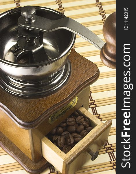 Vintage coffee grinder in brown. Vintage coffee grinder in brown