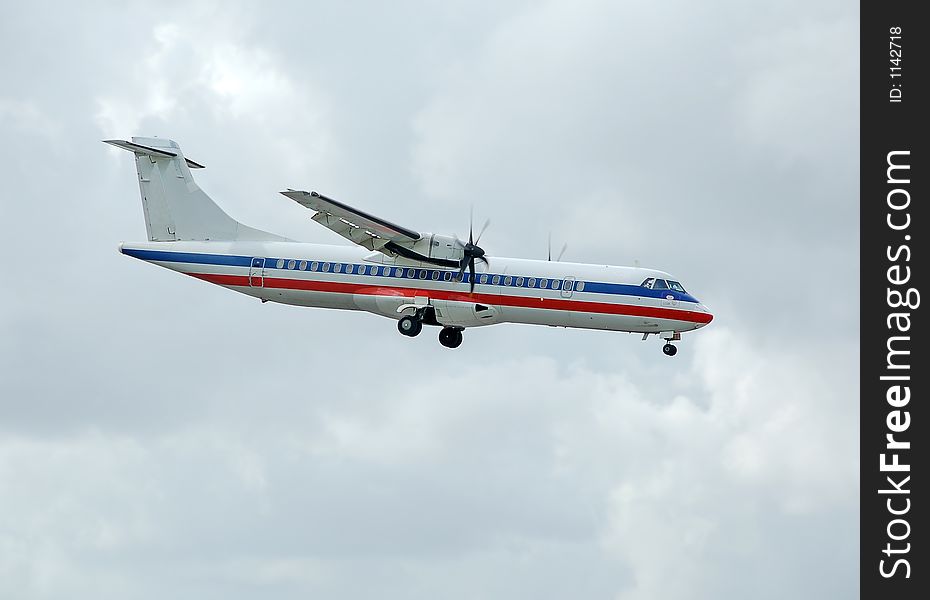 Descending Aerospetiale ATR-72 airplane ready for landing. Descending Aerospetiale ATR-72 airplane ready for landing