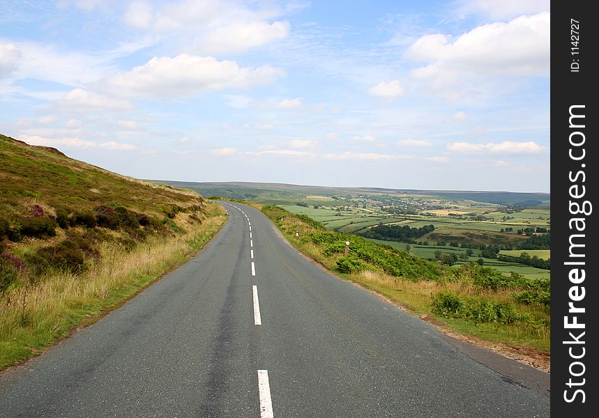 Empty road through Yorkshire countryside. Empty road through Yorkshire countryside.