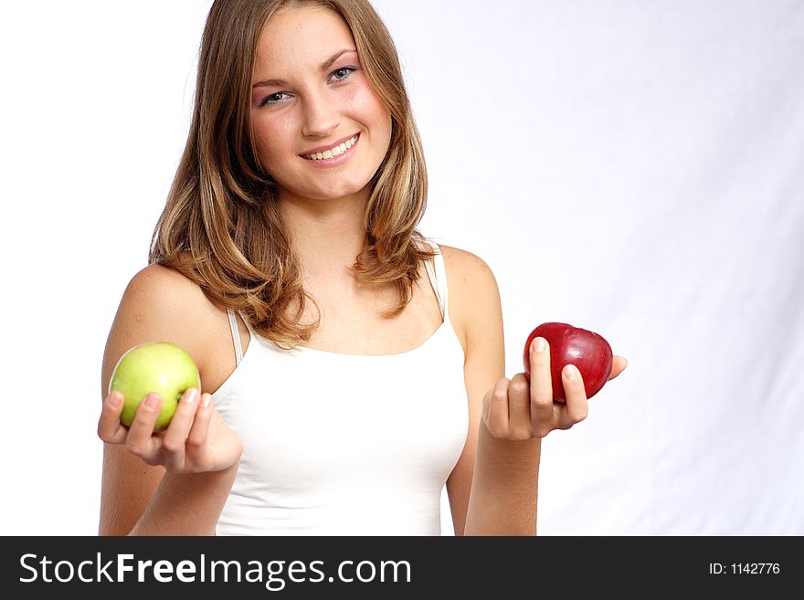 Woman holding green and red apple. Woman holding green and red apple.