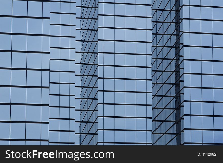 Modern office building with glass exterior, wide orientation