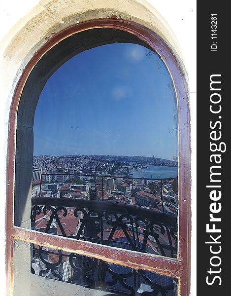 The window has deep color glass, which reflex a fantastic image of Istanbul and Bospurus strait. The window has deep color glass, which reflex a fantastic image of Istanbul and Bospurus strait.