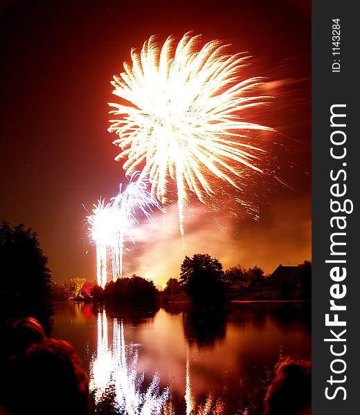 Fireworks and reflection on water