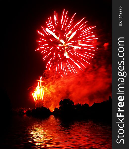 Fireworks and reflection on water