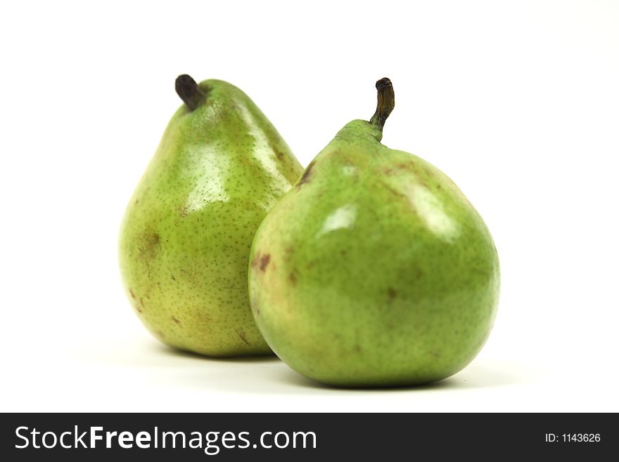 Two pears isolated on white background, shallow depth of field, back pear in focus