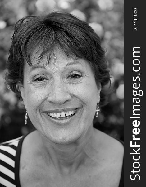 Closeup of a senior citizen smiling in black and white. Closeup of a senior citizen smiling in black and white