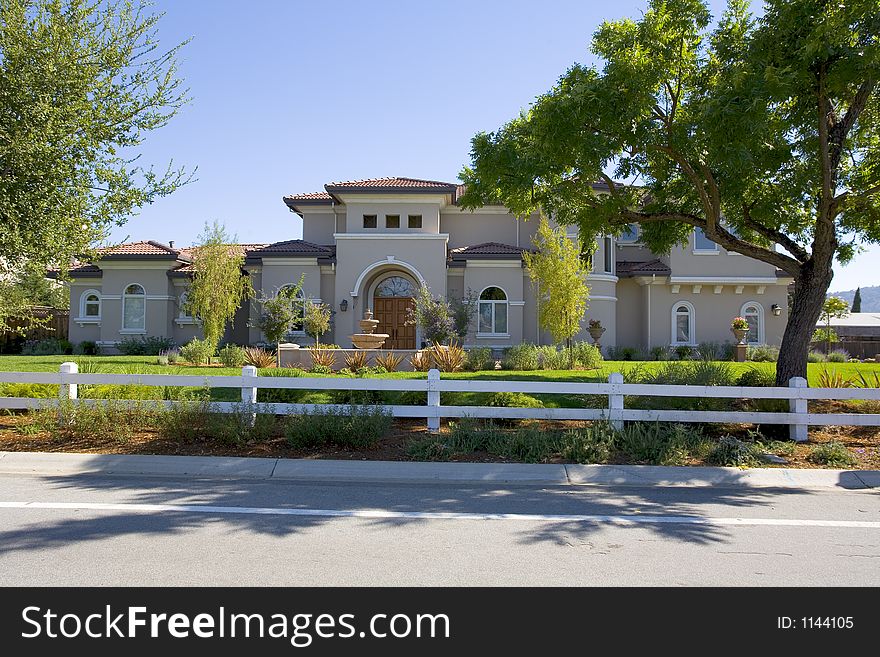 Exterior shot of a large luxurious home.