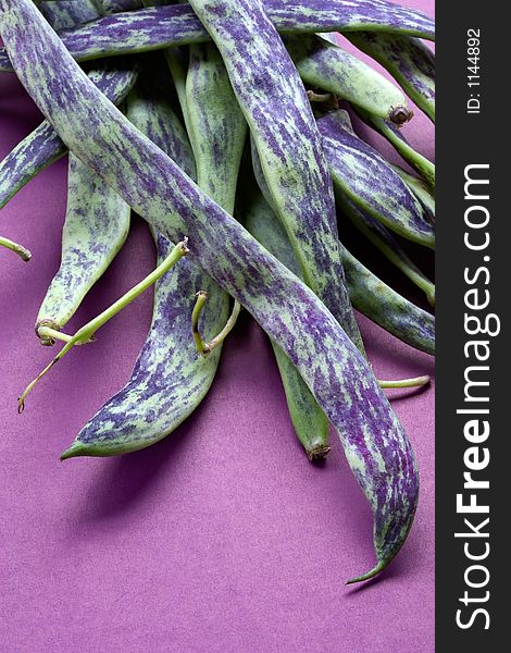 Large multi-coloured pods of a string bean. Large multi-coloured pods of a string bean