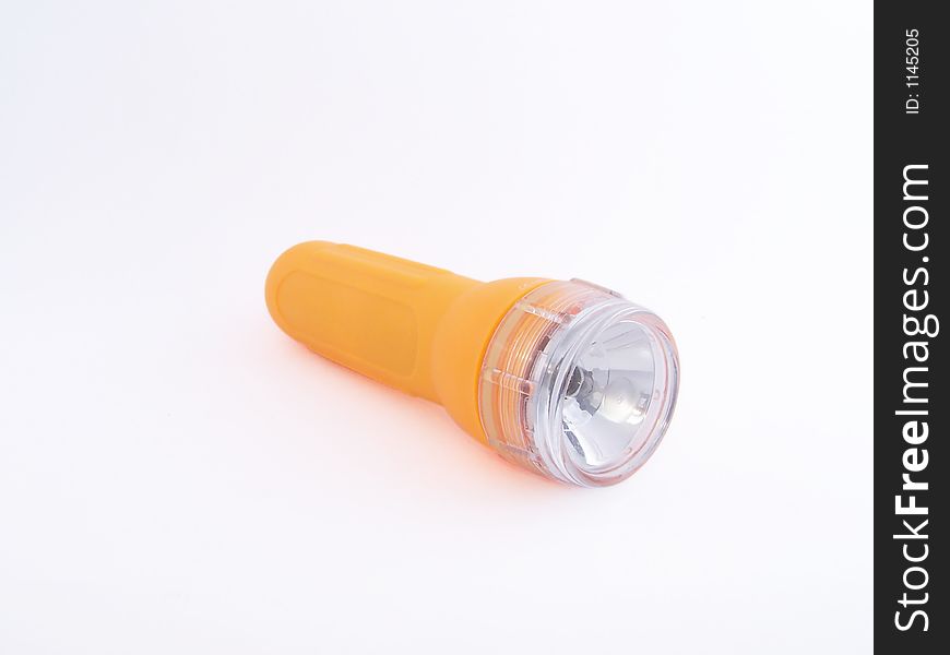 Yellow, waterproof flashlight for travellers