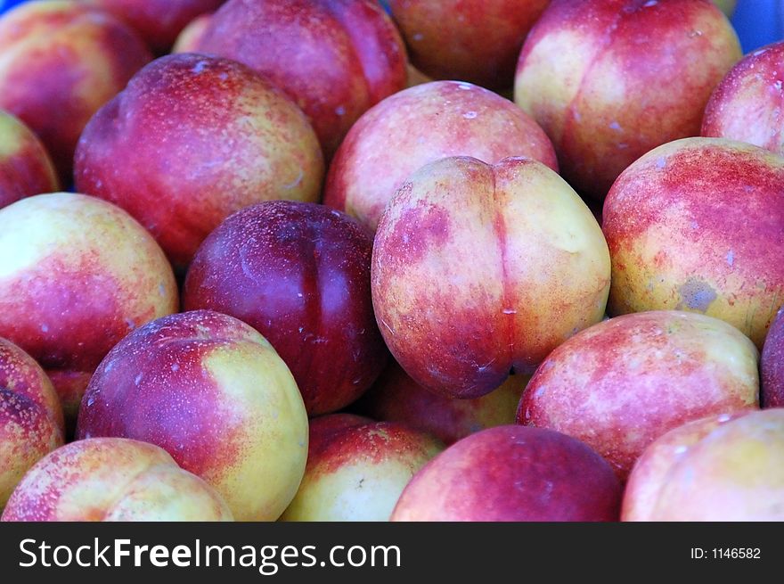 a heap of peaches. a heap of peaches