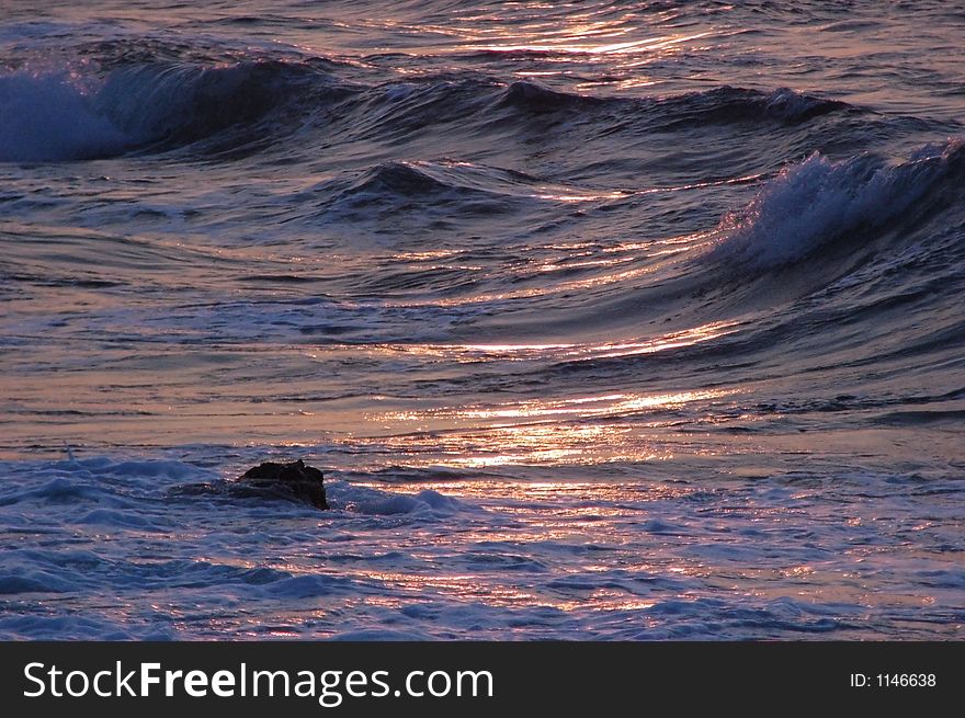 sunrays reflecting on the waves. sunrays reflecting on the waves