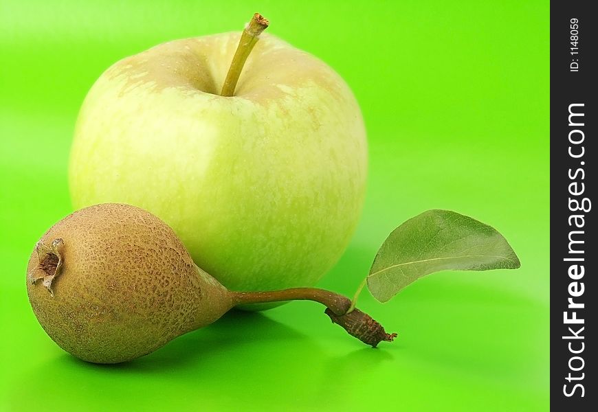 Apple & Pear with Fluorescent Green Background.