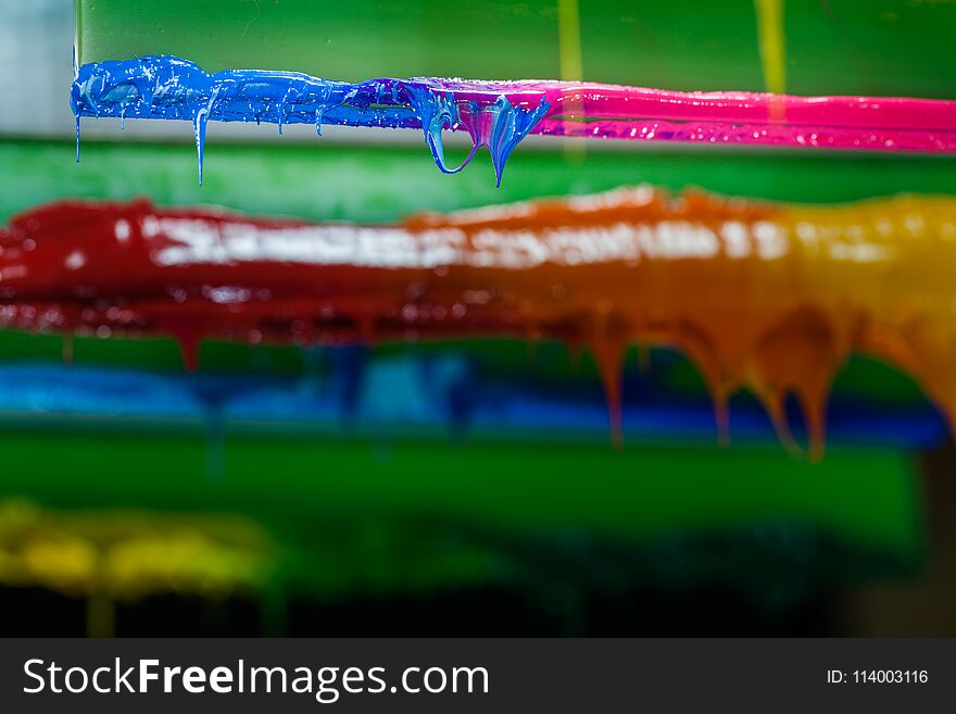 Colors Dripping From The Rubber Print Handle