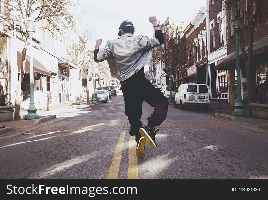 Photo of Man Dancing in the Street